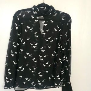 Black sheer top with white birds